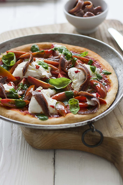 Double Tomato Pizza with Burrata Cheese, Anchovies, Basil Olive Oil and Chilli