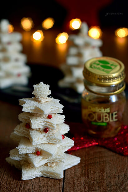 Small Christmas Tree Canapes with Anchovies and Capers