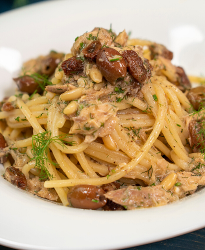 Spaghetti Pasta with mackerel fillets, olives, capers, raisins, pine nuts and fennel