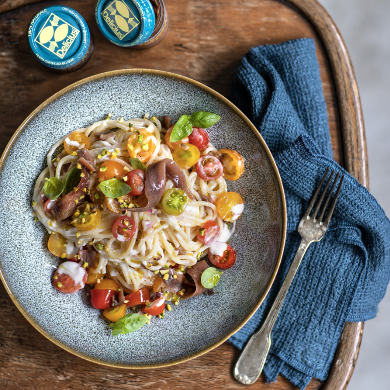 Spaghetti with goat cheese cream and anchovies from Sicily