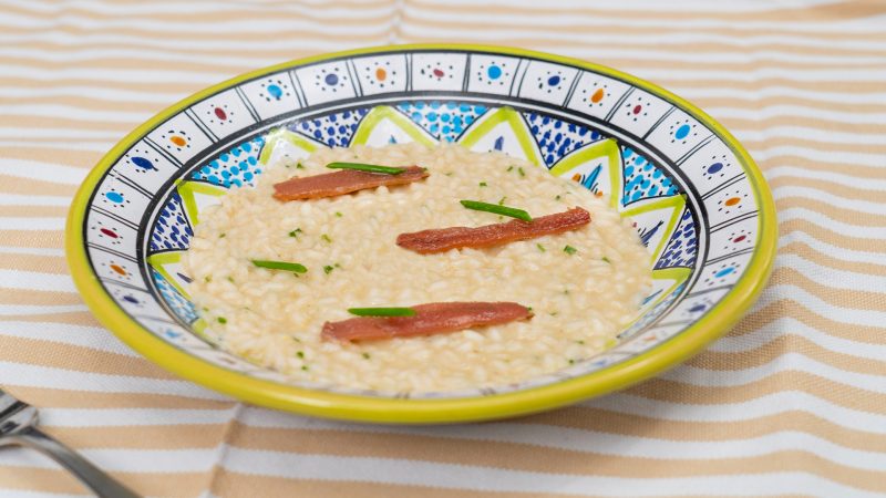 Risotto burro, alici e erba cipollina