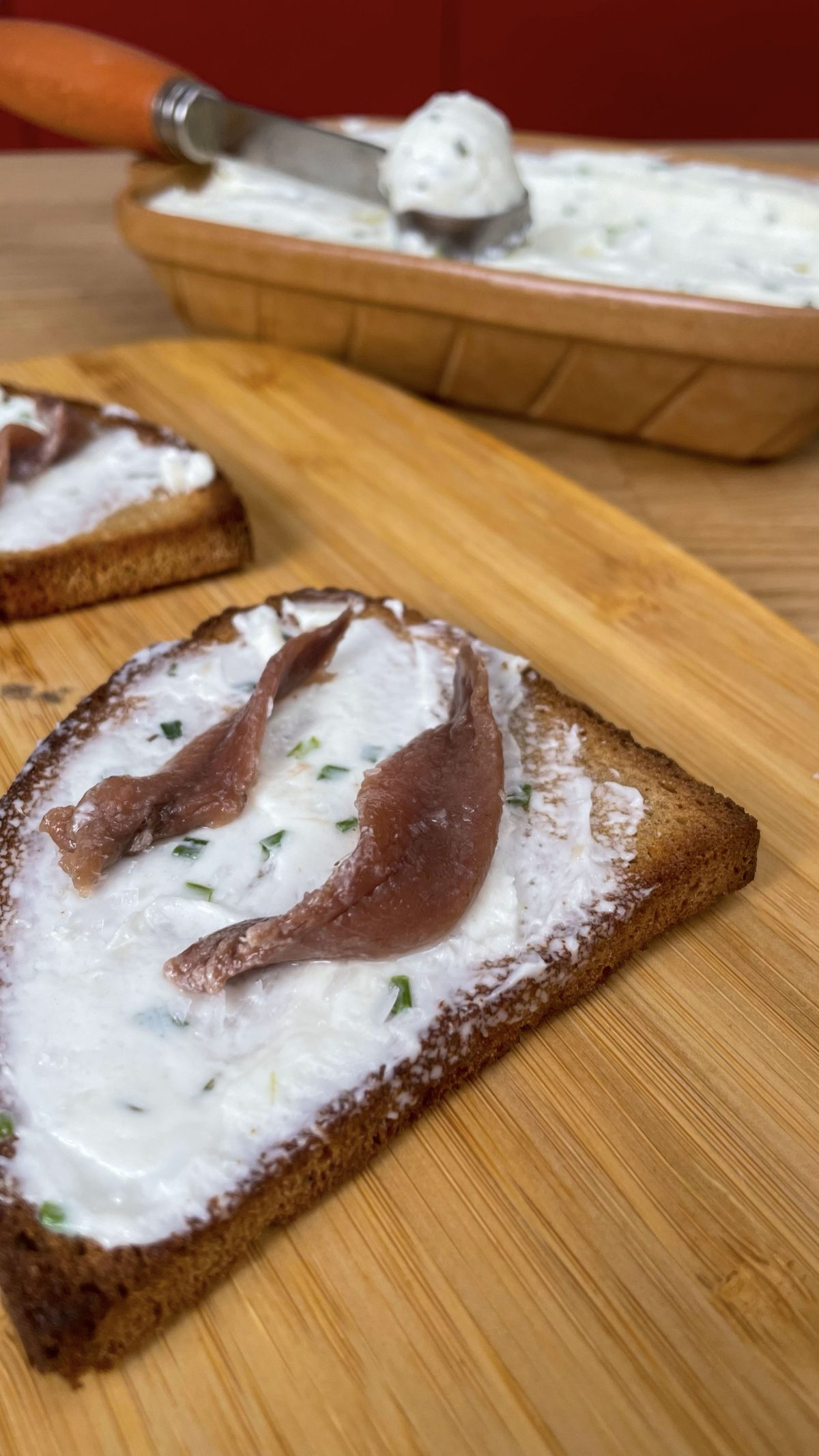 BREAD CROUTONS WITH HOME-MADE BUTTER AND ANCHOVY FILLETS