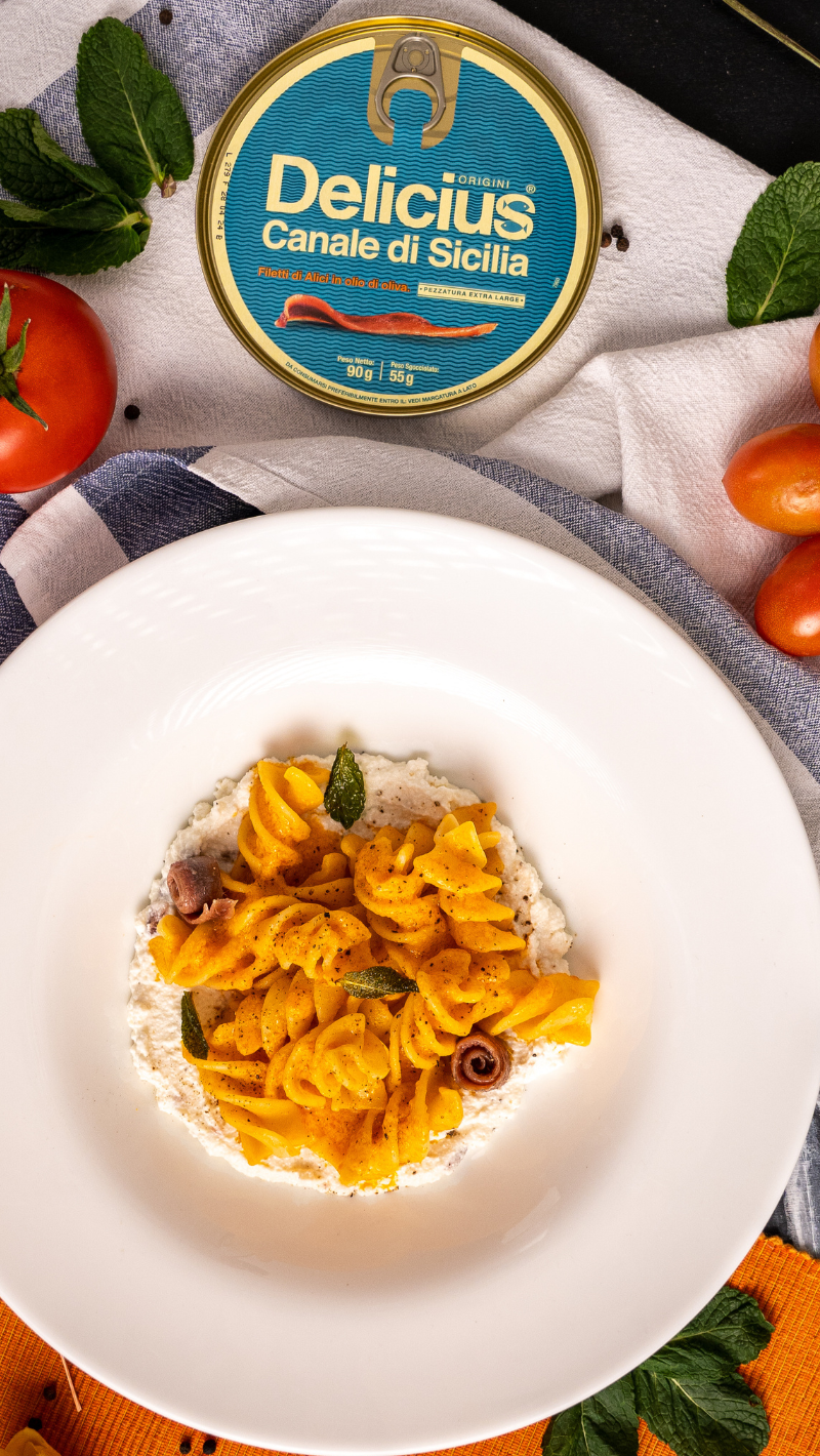 Fusilloni pasta, ricotta cheese flavored with Anchovies from Canale di Sicilia, fresh tomato sauce and mint