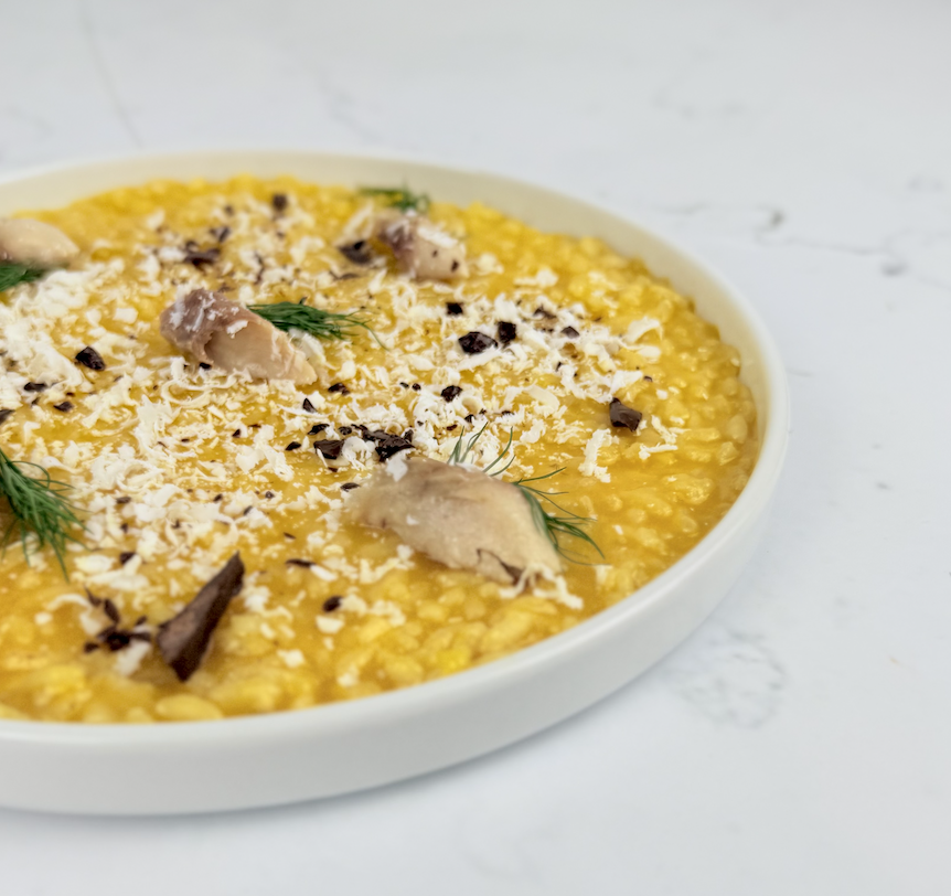 Risotto cremoso alla zucca e sgombro con note di cioccolato e ricotta salata