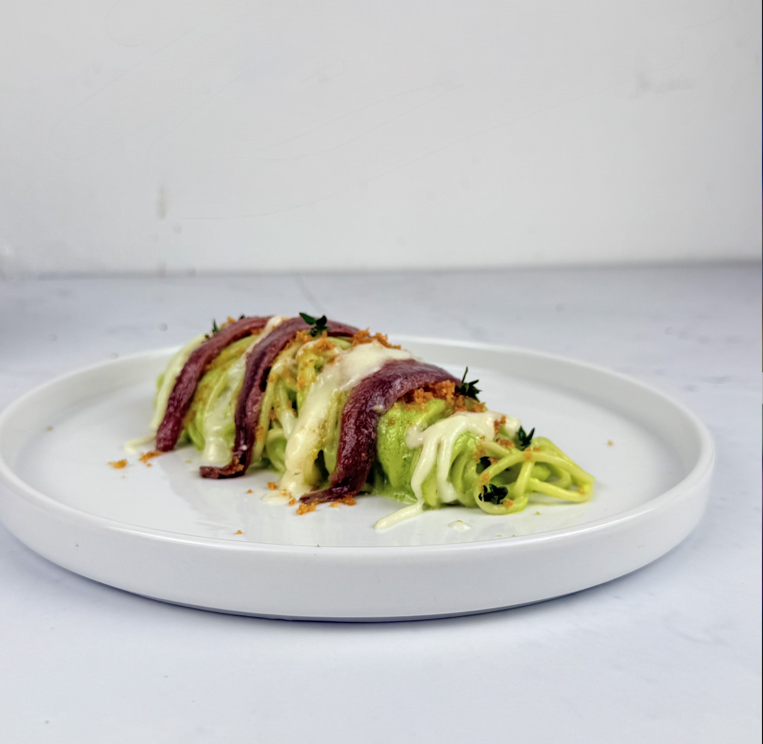 Spaghetti cremosi con gorgonzola, broccoli e alici